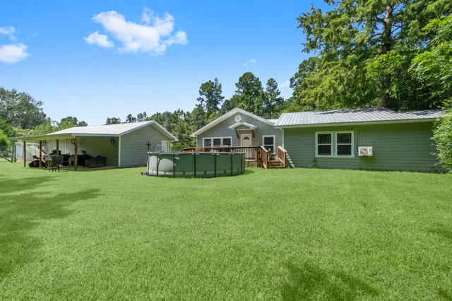 a front view of a house with a garden and porch