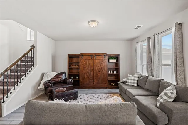 a living room with furniture and a couch