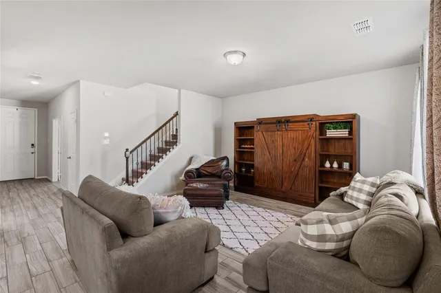 a living room with furniture and a couch