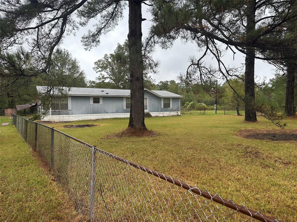 a view of a house with swimming pool