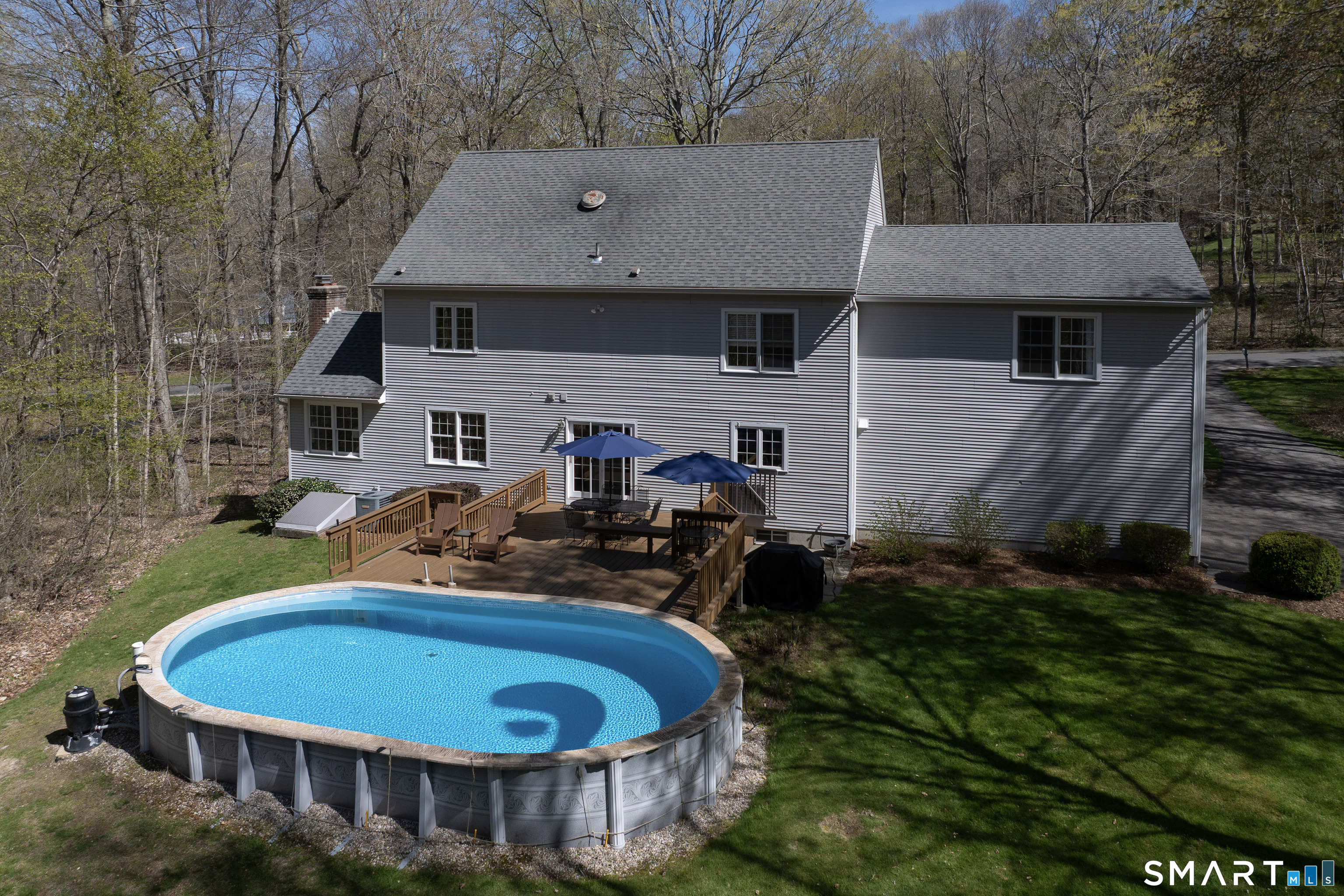 51 Fawn Hill Road Killingworth, CT 06419 - Photo 33 of 37 Pool off the deck in the back yard