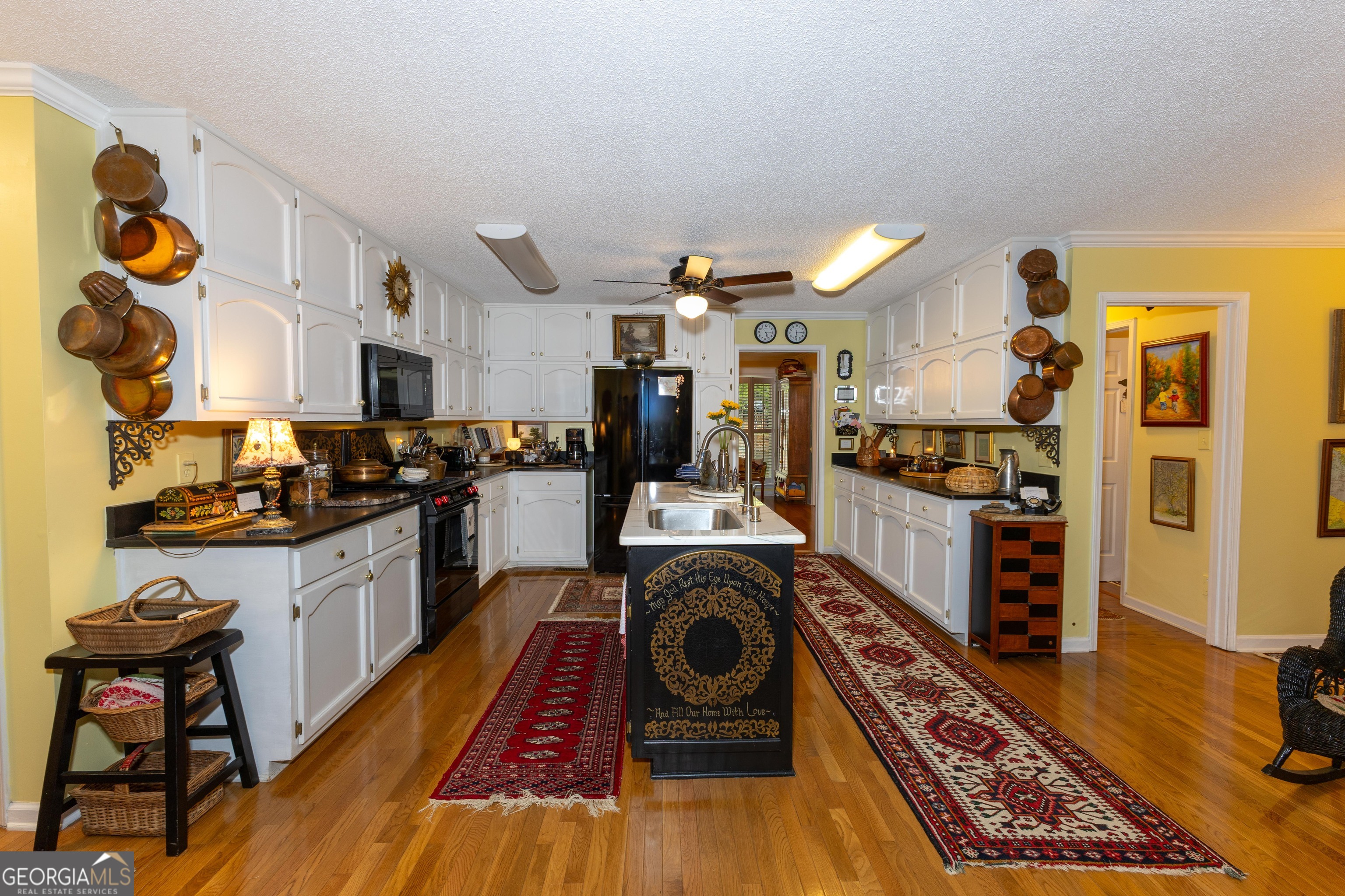 175 Weeping Willow Way Tyrone, GA 30290 - Photo 21 of 59 a kitchen with stainless steel appliances granite countertop a stove and a refrigerator