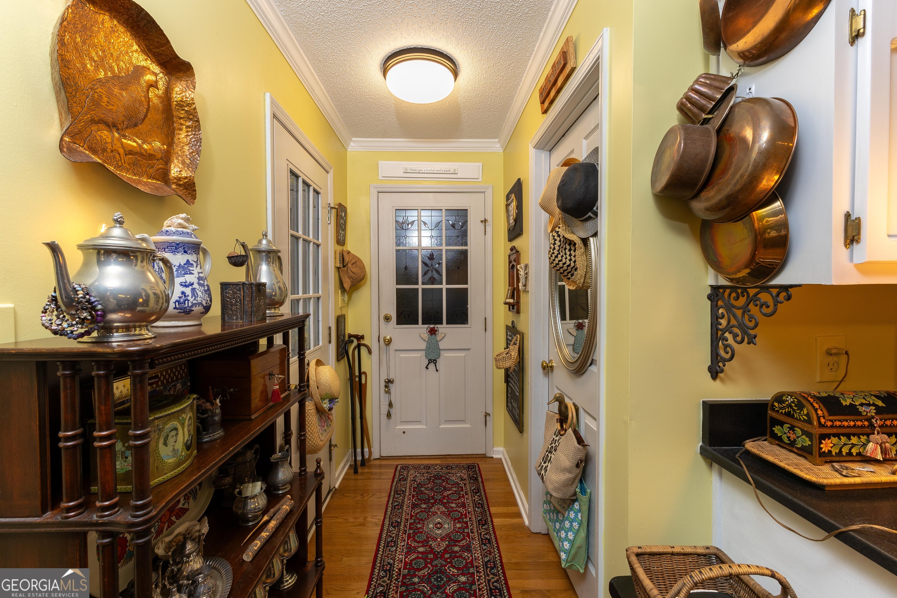 175 Weeping Willow Way Tyrone, GA 30290 - Photo 22 of 59 a view of walk in closet with clothes and shoes