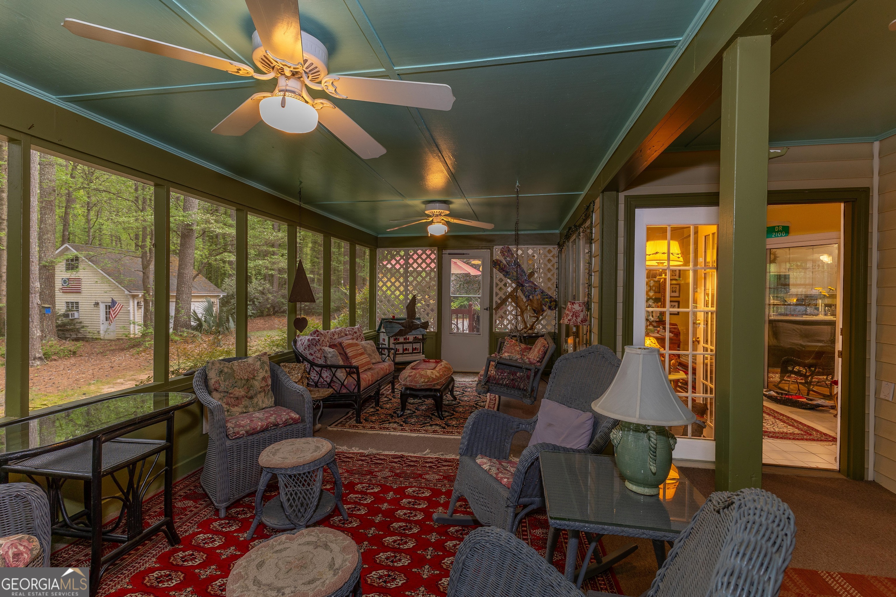 175 Weeping Willow Way Tyrone, GA 30290 - Photo 30 of 59 a living room with furniture a ceiling fan and a large window