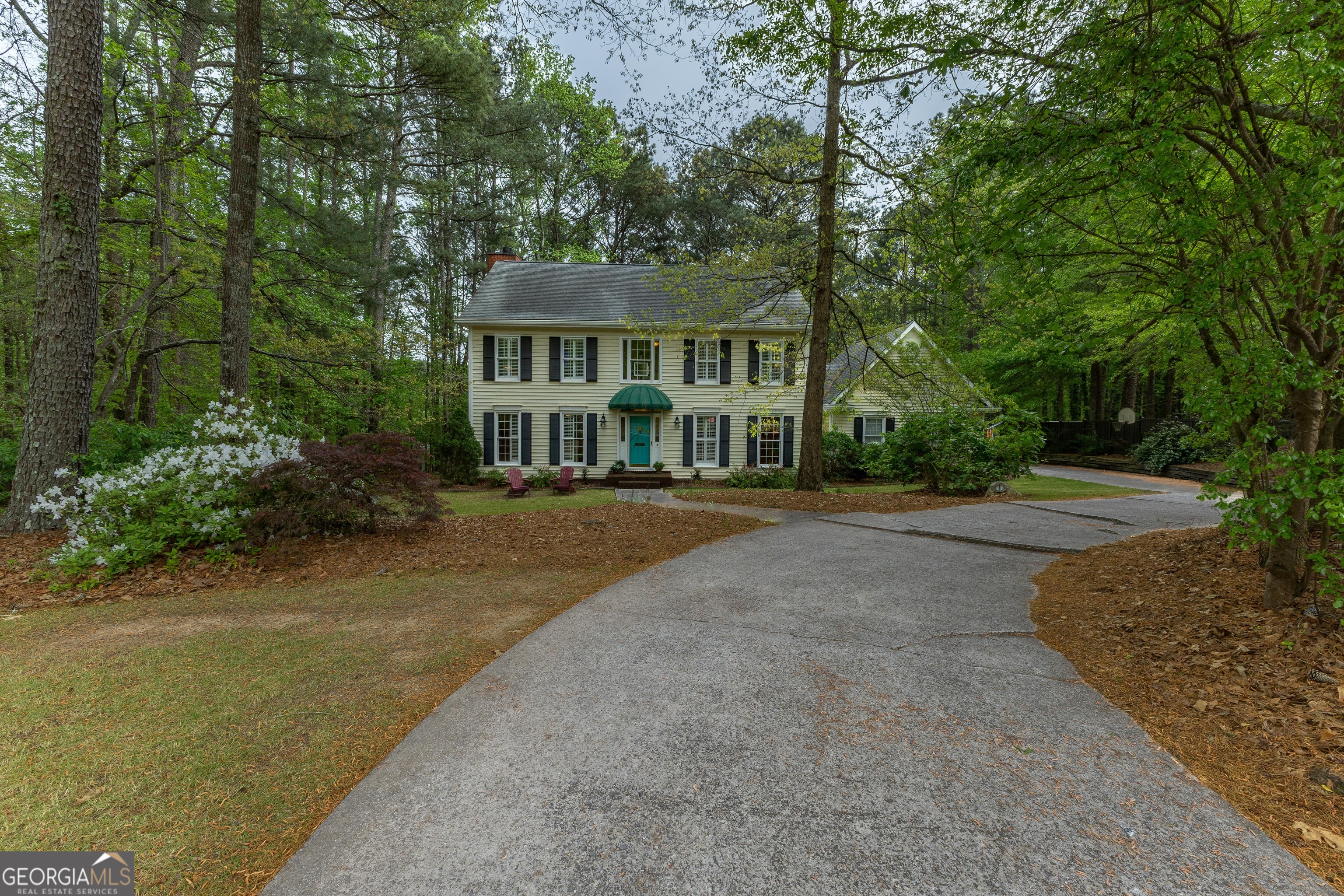 175 Weeping Willow Way Tyrone, GA 30290 - Photo 3 of 59 a front view of a house with a yard and trees