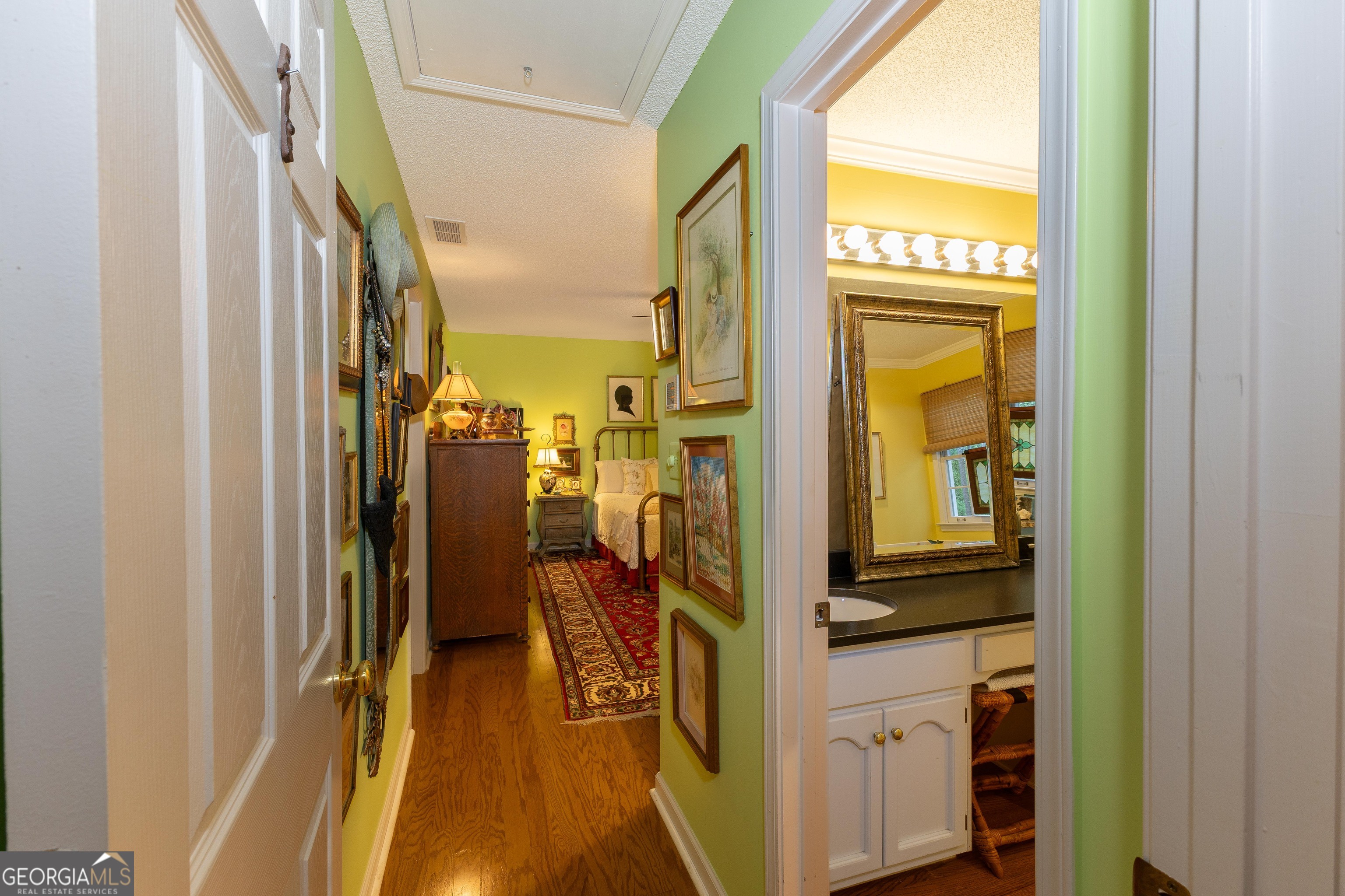 175 Weeping Willow Way Tyrone, GA 30290 - Photo 33 of 59 a view of walk in closet with clothes and shoes