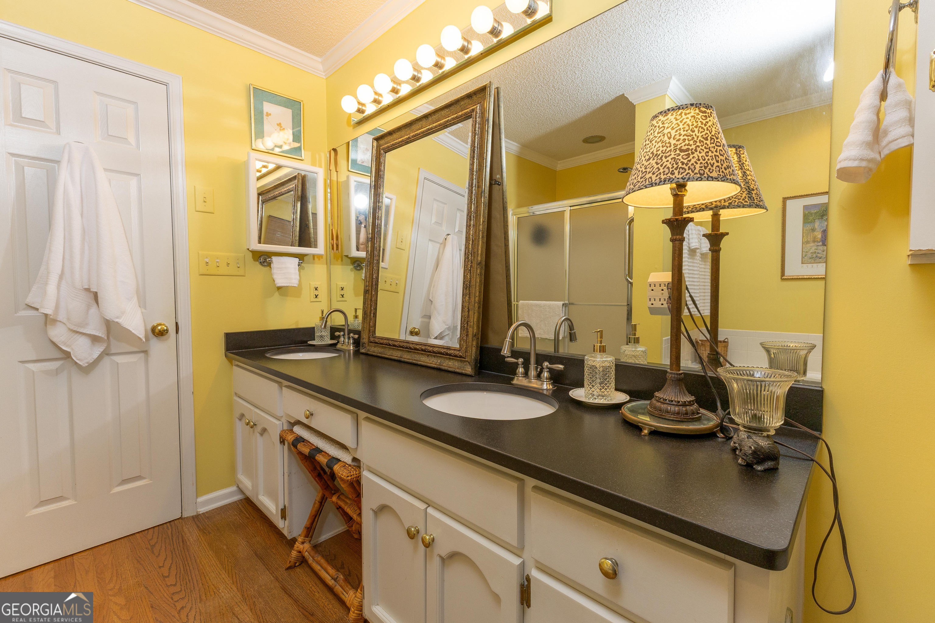 175 Weeping Willow Way Tyrone, GA 30290 - Photo 36 of 59 a bathroom with a granite countertop sink and a mirror