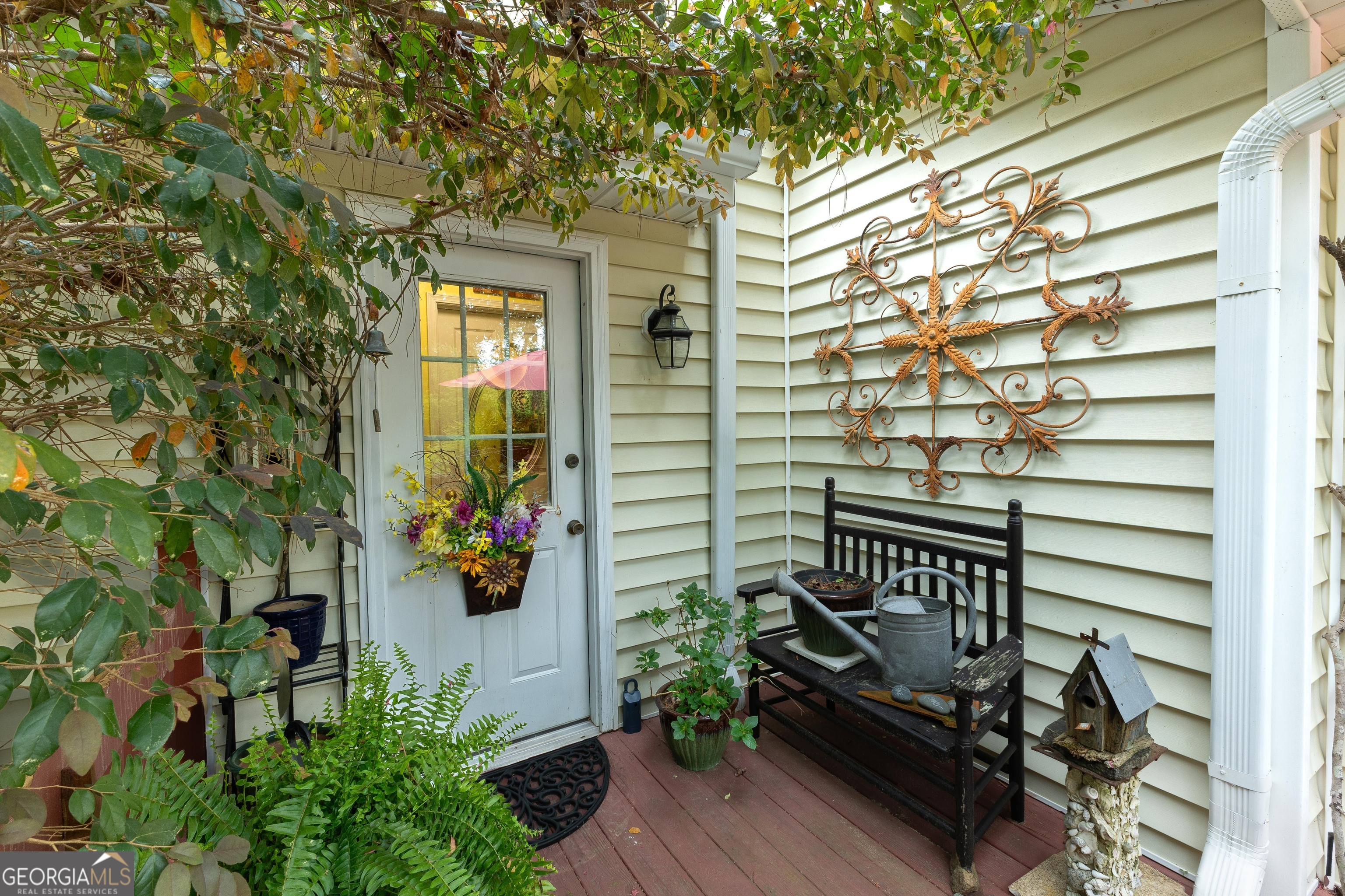 175 Weeping Willow Way Tyrone, GA 30290 - Photo 47 of 59 a view of a balcony with chairs and potted plants