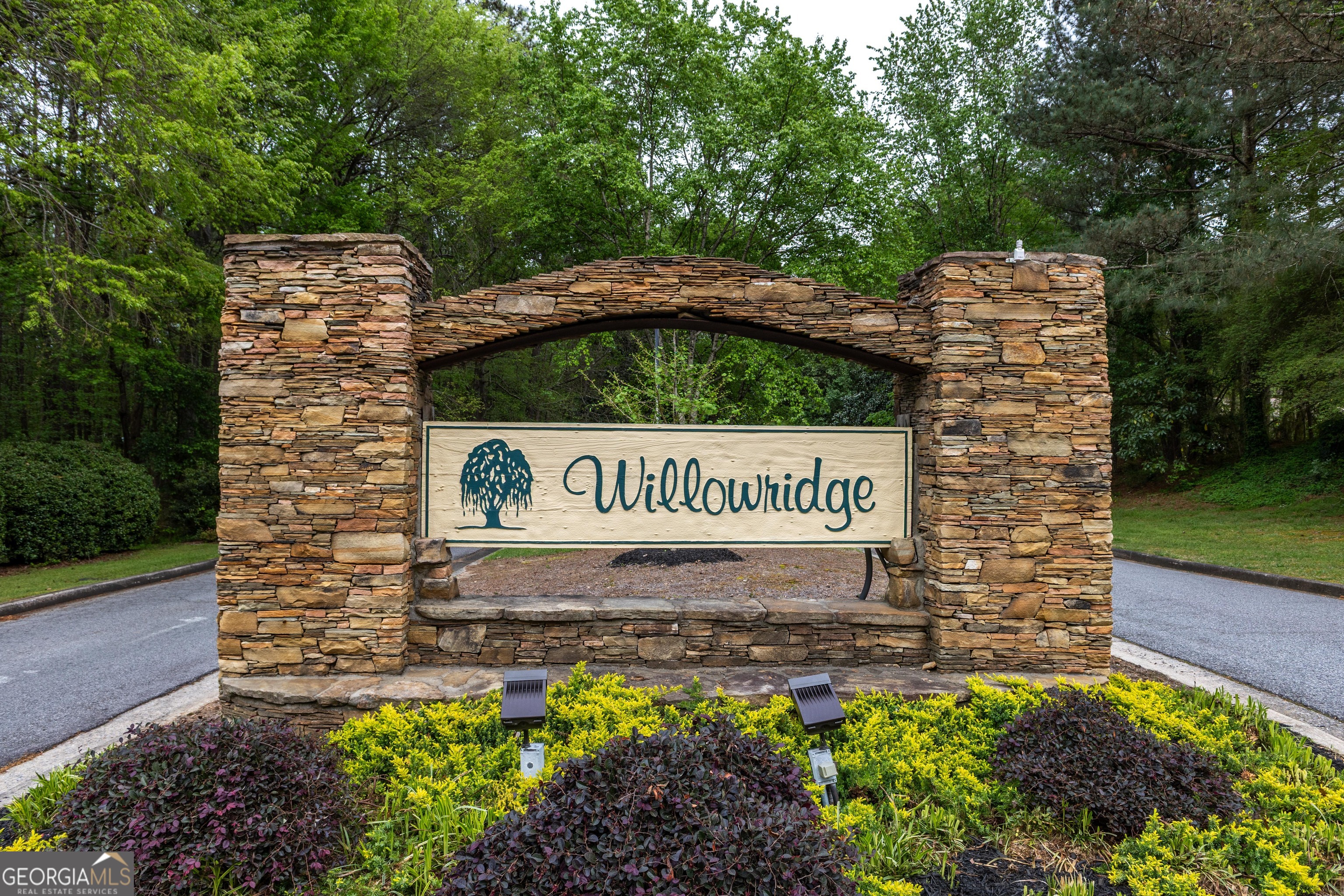 175 Weeping Willow Way Tyrone, GA 30290 - Photo 57 of 59 a sign on the side of a building