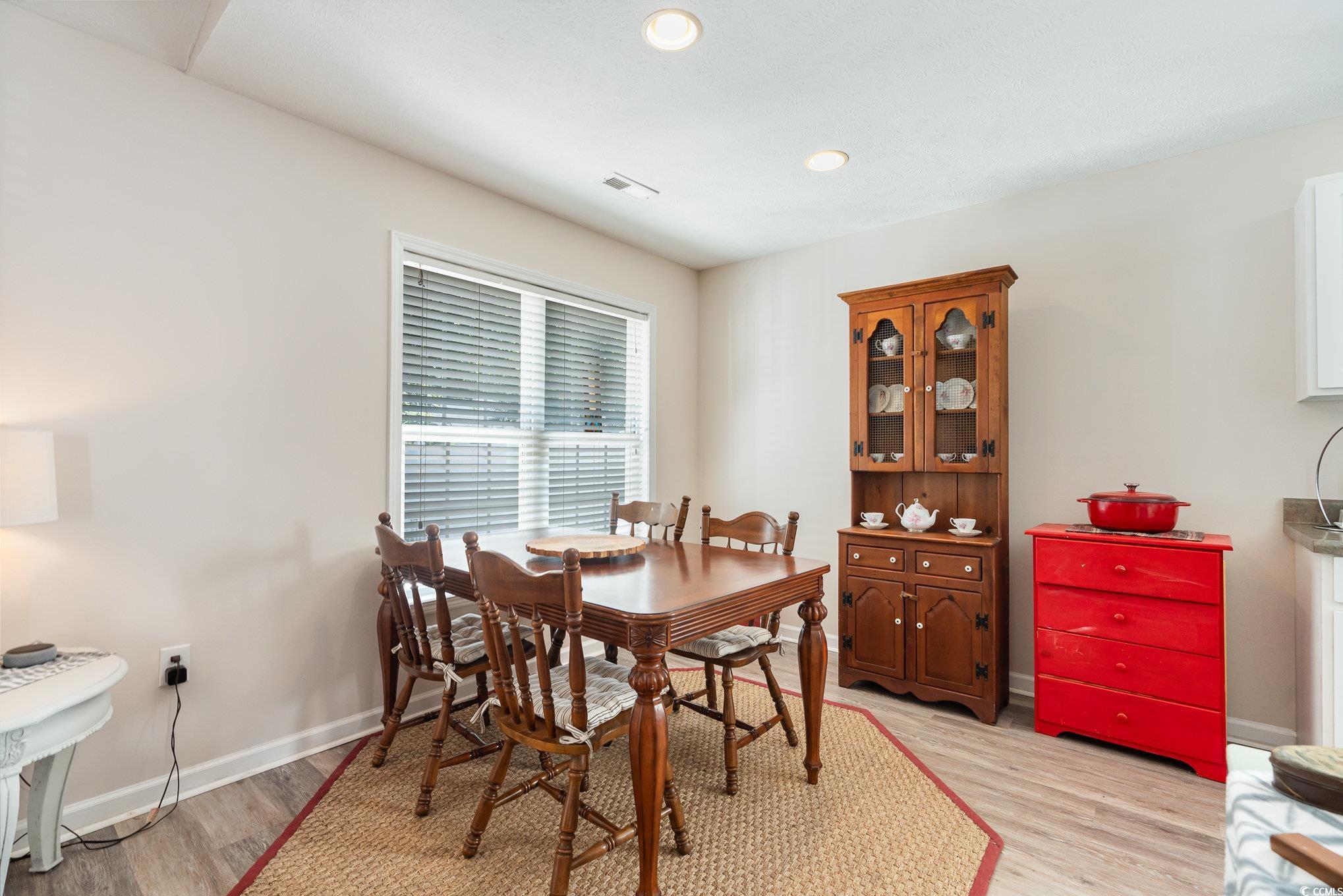 1005 Autumn Drive Murrells Inlet, SC 29576 - Photo 12 of 25 Dining area featuring light wood-type flooring