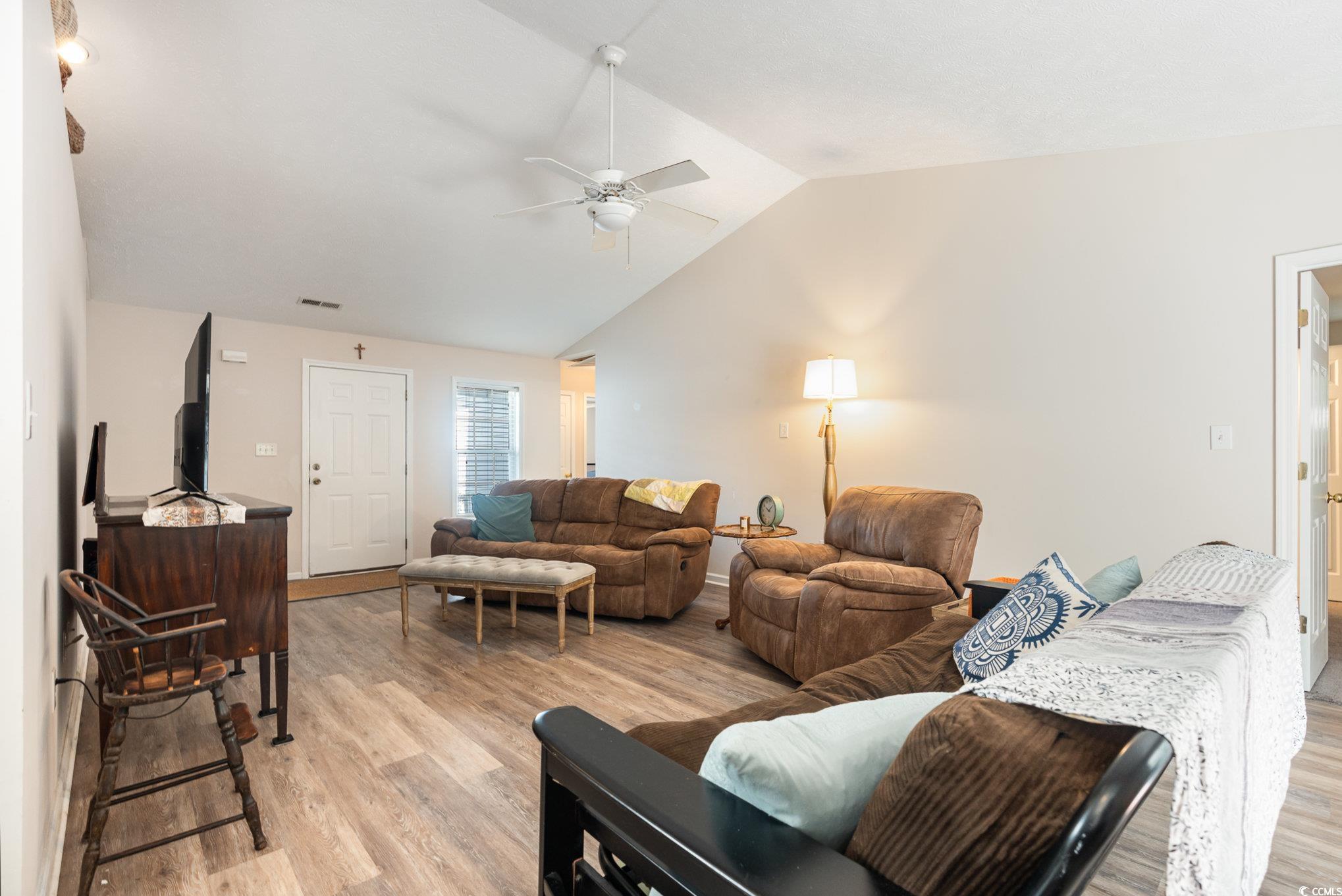 1005 Autumn Drive Murrells Inlet, SC 29576 - Photo 14 of 25 Living room featuring ceiling fan, lofted ceiling,