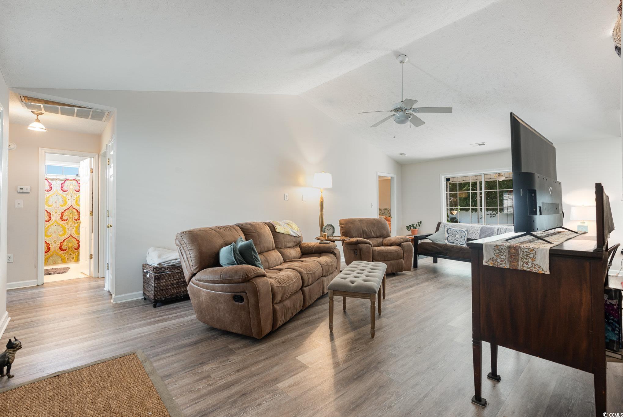 1005 Autumn Drive Murrells Inlet, SC 29576 - Photo 15 of 25 Living room with ceiling fan, light hardwood / woo