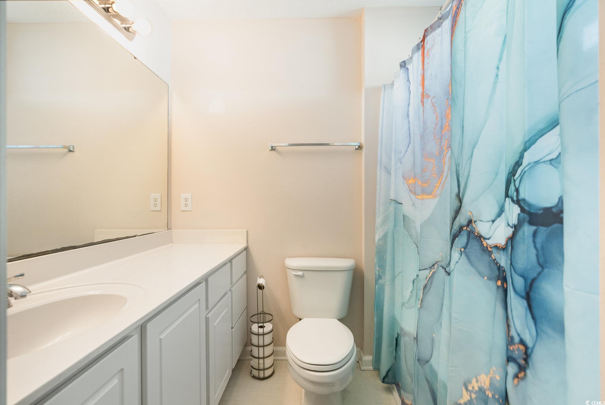 1005 Autumn Drive Murrells Inlet, SC 29576 - Photo 20 of 25 Bathroom featuring tile patterned floors, vanity,