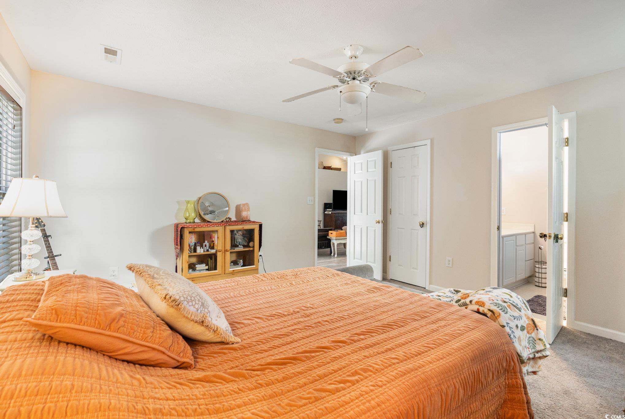 1005 Autumn Drive Murrells Inlet, SC 29576 - Photo 21 of 25 Carpeted bedroom featuring ceiling fan and connect