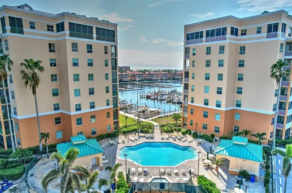 a view of a swimming pool with a patio
