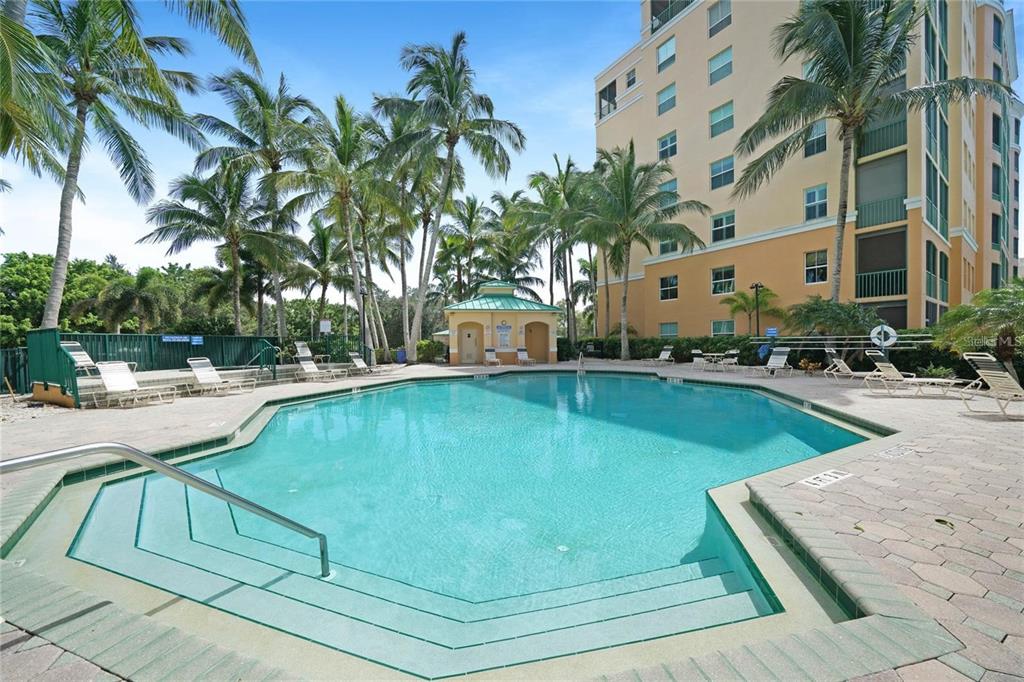 2060 Matecumbe Key Road, Unit 2107 Punta Gorda, FL 33955 - Photo 30 of 44 a view of a swimming pool with a patio