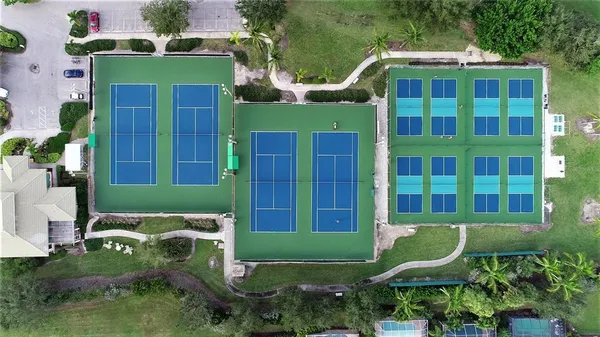 a view of a swimming pool with a yard