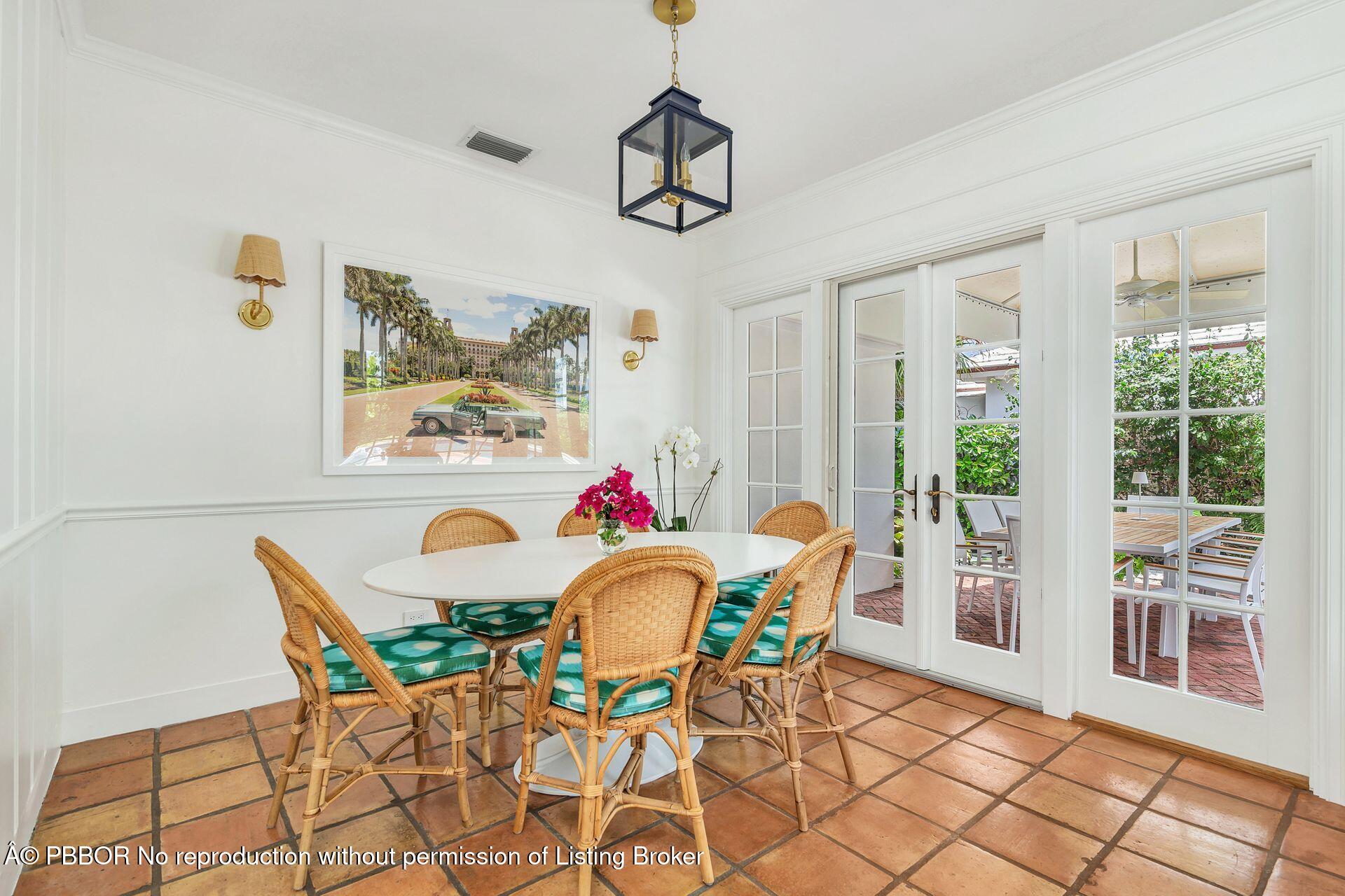 255 Colonial Lane Palm Beach, FL 33480 - Photo 9 of 32 a view of a dining room with furniture window and outside view