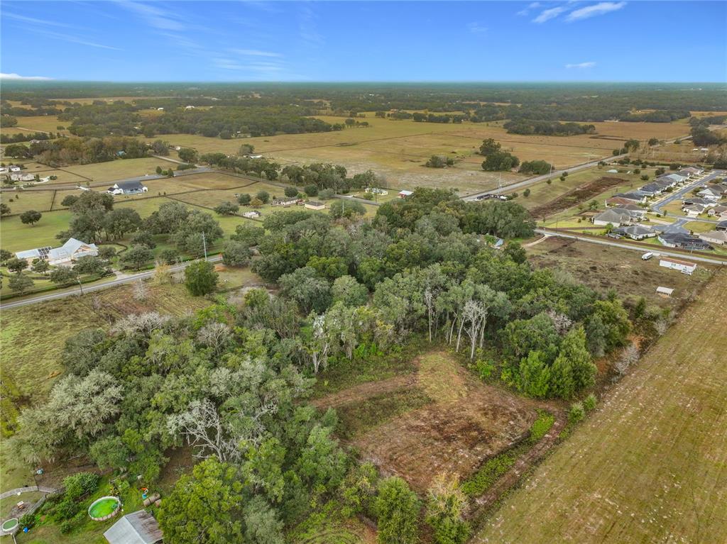 209 County Road Oxford, FL 34484 - Photo 13 of 14 a view of a city with an ocean