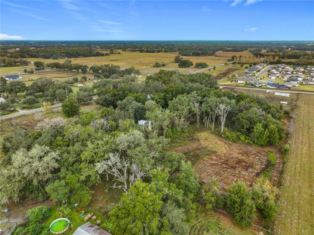 209 County Road Oxford, FL 34484 - Photo 10 of 14 a view of an outdoor space and a yard