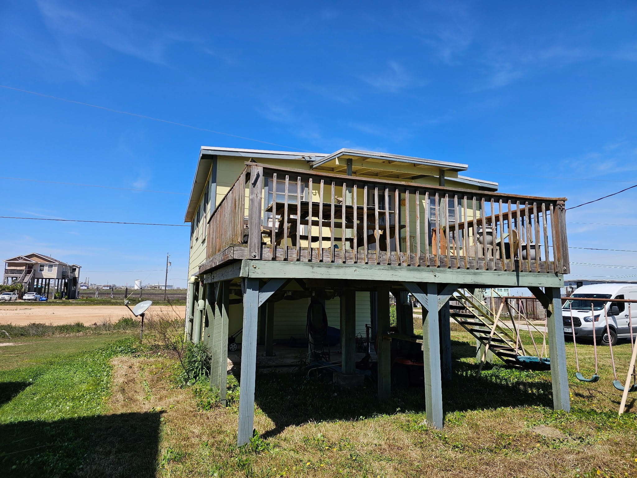 605 Texas Street Surfside Beach, TX 77541 - Photo 2 of 8 a view of a roof deck
