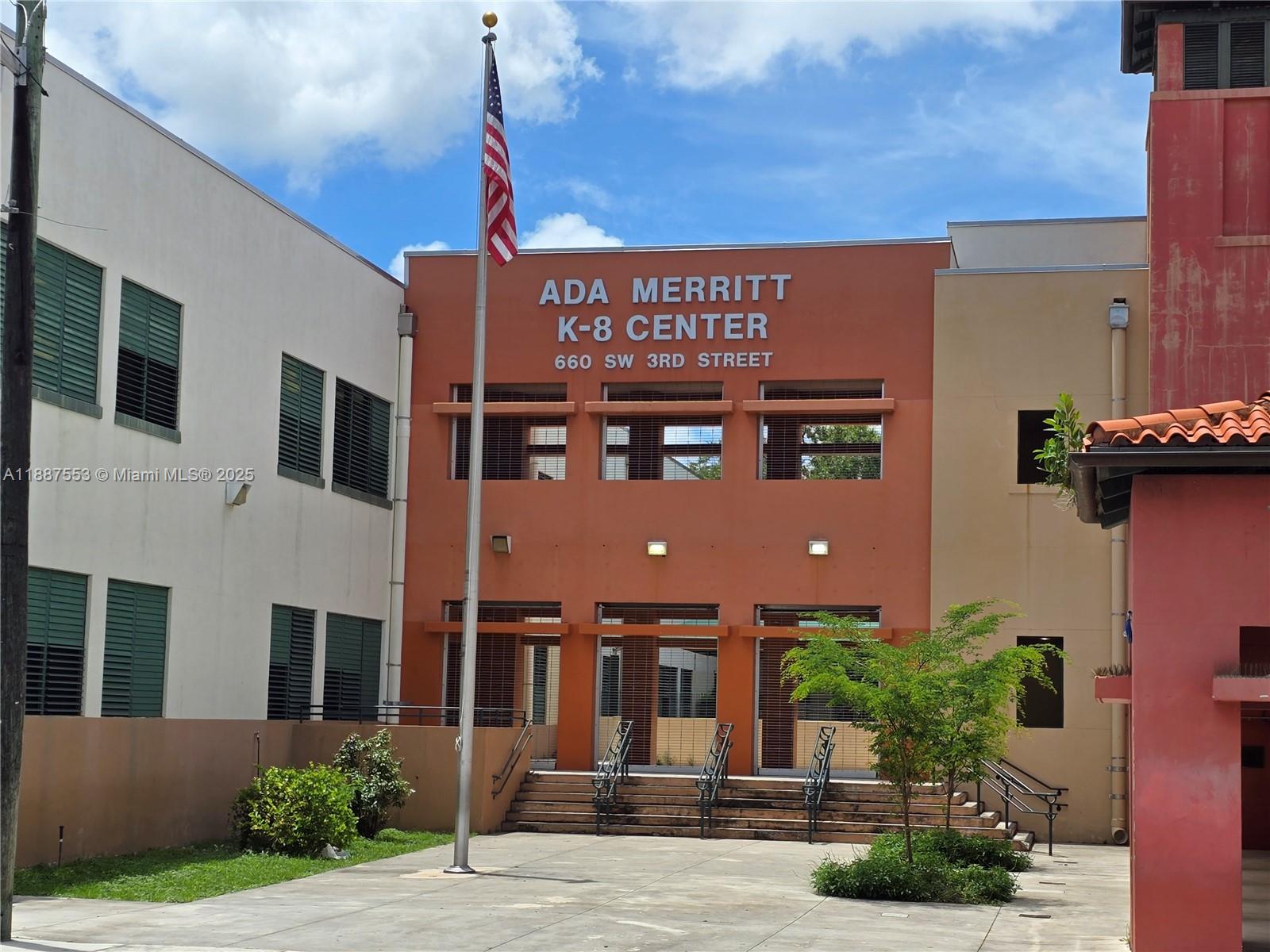 637 Southwest 3rd Street, Unit 404 Miami, FL 33130 - Photo 13 of 14 a front view of a building with potted plants