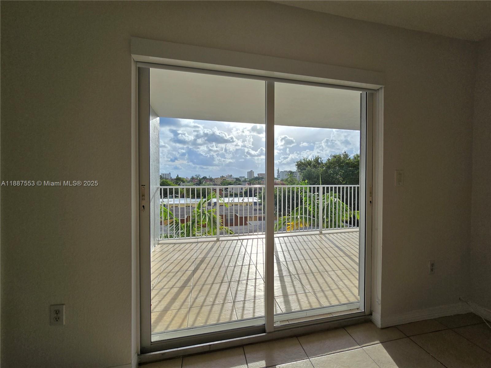 637 Southwest 3rd Street, Unit 404 Miami, FL 33130 - Photo 2 of 14 a view of a room that has a bed
