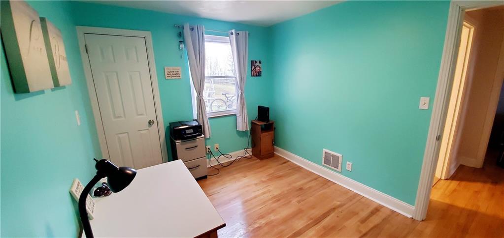 8117 Peebles Road Pittsburgh, PA 15237 - Photo 14 of 20 a room with window and closet