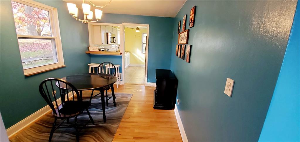 8117 Peebles Road Pittsburgh, PA 15237 - Photo 6 of 20 a view of a dining room with furniture and a window