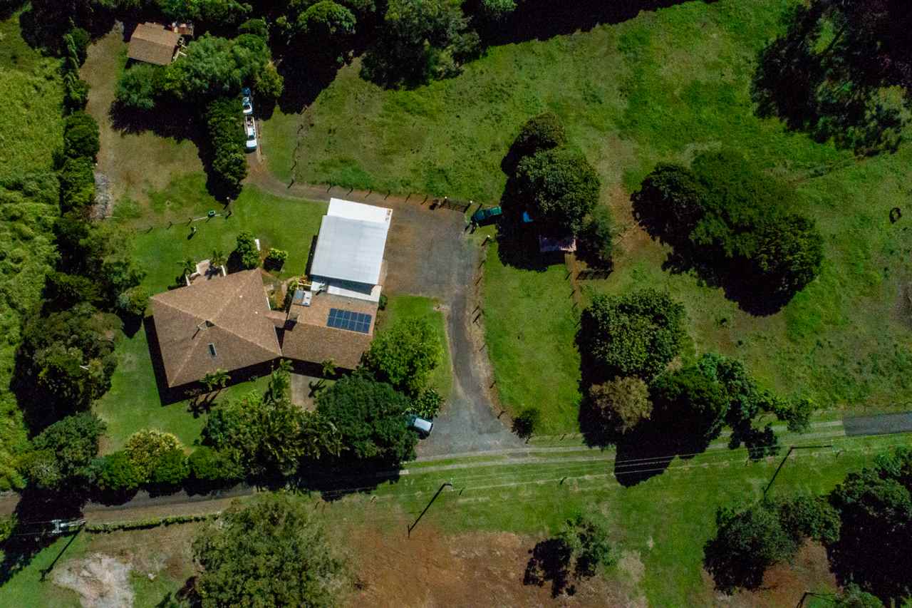 2589 Kokomo Road Haiku, HI 96708 - Photo 28 of 30 an aerial view of a house with a yard