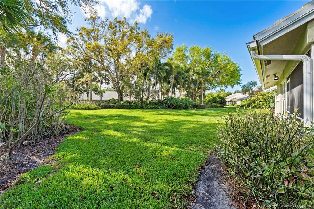 2437 Southwest Foxpoint Trail Palm City, FL 34990 - Photo 38 of 60 a view of a big yard