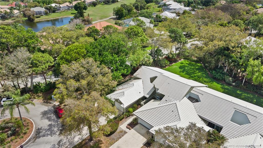 2437 Southwest Foxpoint Trail Palm City, FL 34990 - Photo 39 of 60 an aerial view of a house with a yard