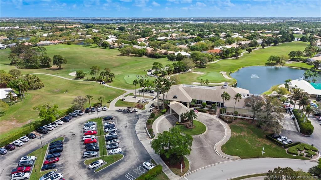 2437 Southwest Foxpoint Trail Palm City, FL 34990 - Photo 45 of 60 an aerial view of a house with a garden