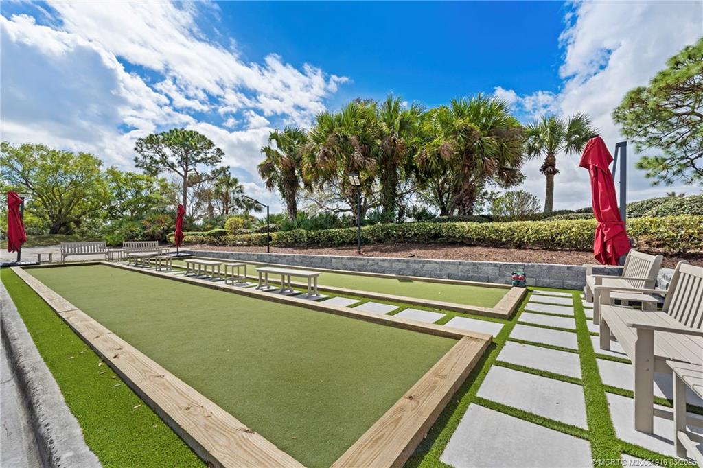 2437 Southwest Foxpoint Trail Palm City, FL 34990 - Photo 48 of 60 a view of swimming pool with seating area