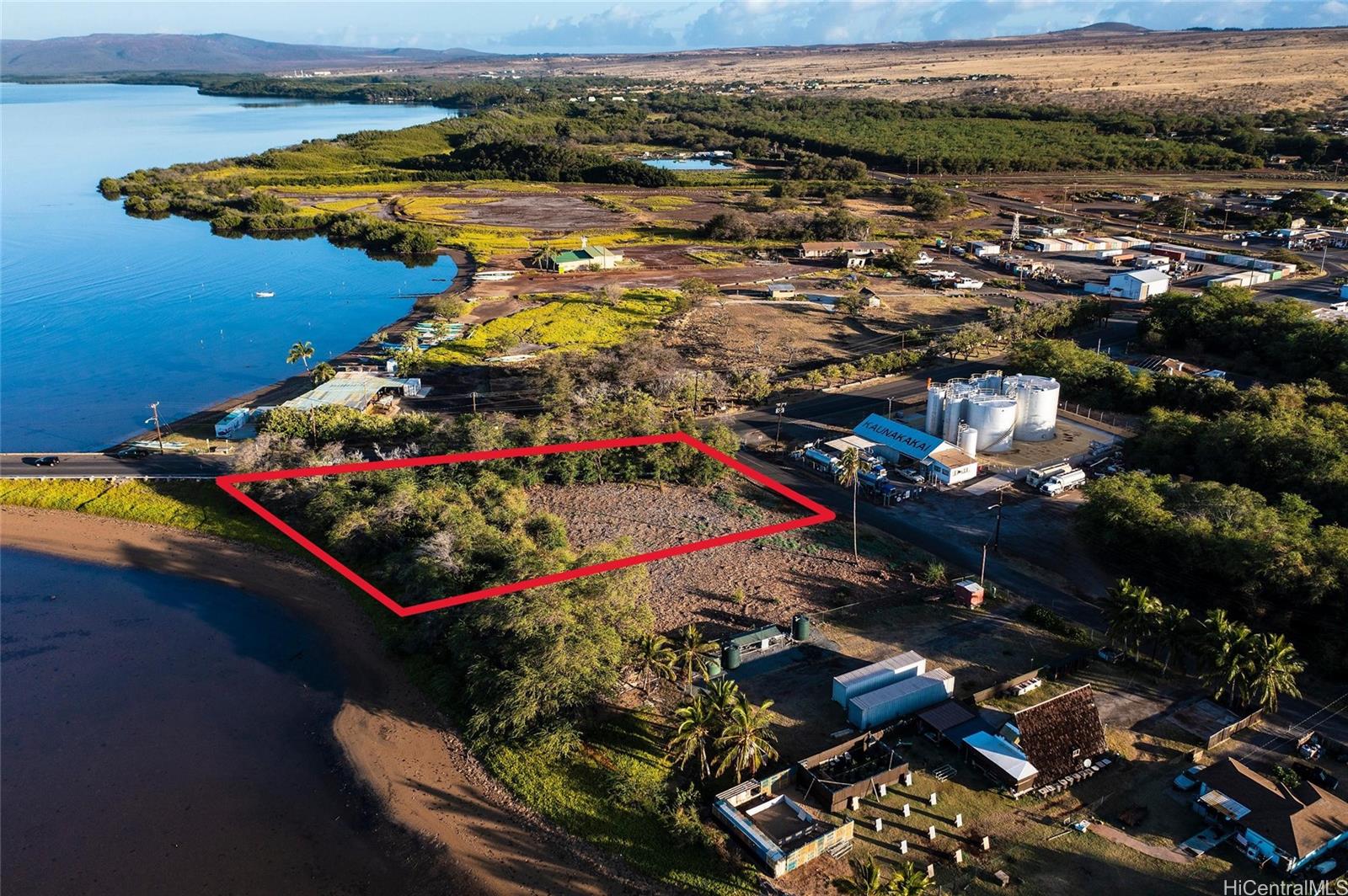 125 Kaunakakai Place Kaunakakai, HI 96748 - Photo 2 of 6 an aerial view of residential houses with outdoor space