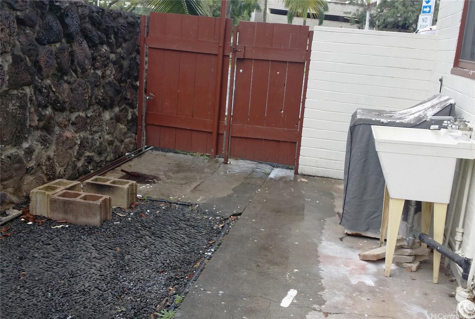 1449 Punchbowl Street Honolulu, HI 96813 - Photo 12 of 18 a view of a backyard with chairs and a stove