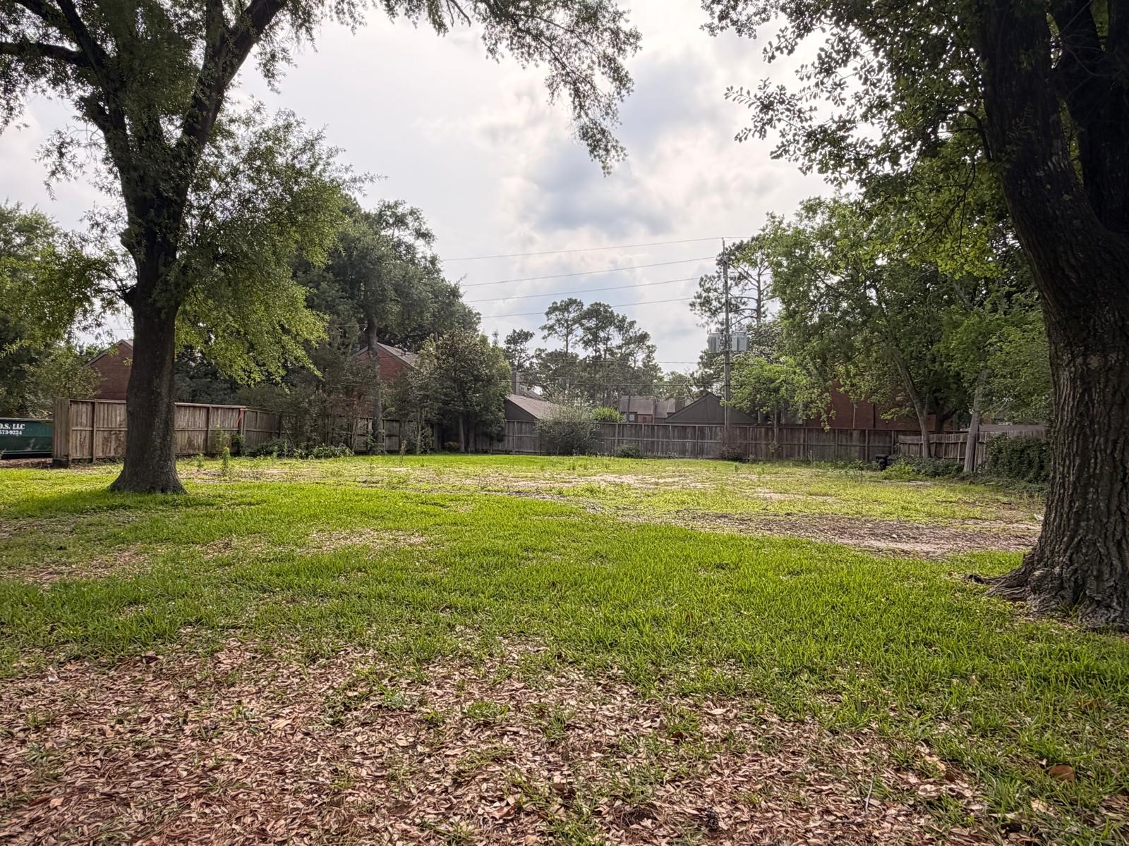 802 Chimney Rock Road Houston, TX 77057 - Photo 3 of 7 a view of outdoor space with deck and trees