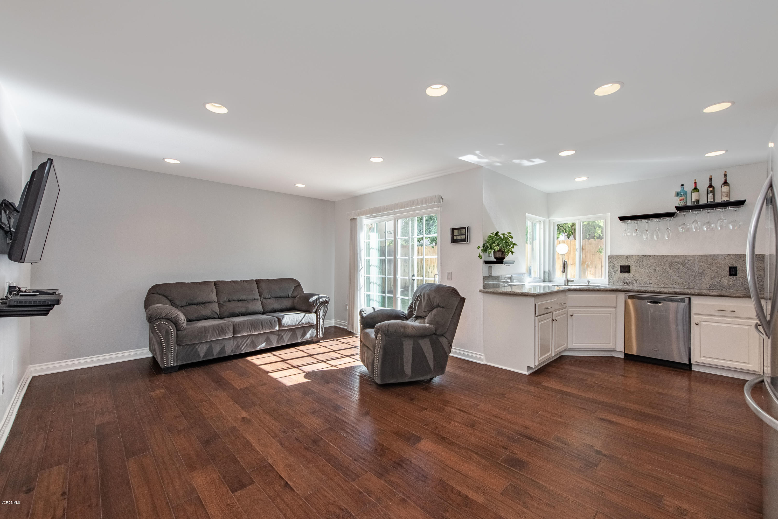 15430 Kernvale Avenue Moorpark, CA 93021 - Photo 5 of 16 a living room with furniture and a wooden floor
