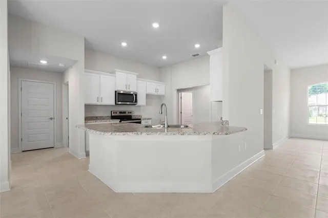 $375,900 | 128 Bird Of Paradise Drive, Palm Coast, FL 32137