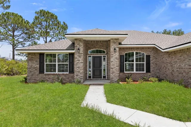 $375,900 | 128 Bird Of Paradise Drive, Palm Coast, FL 32137