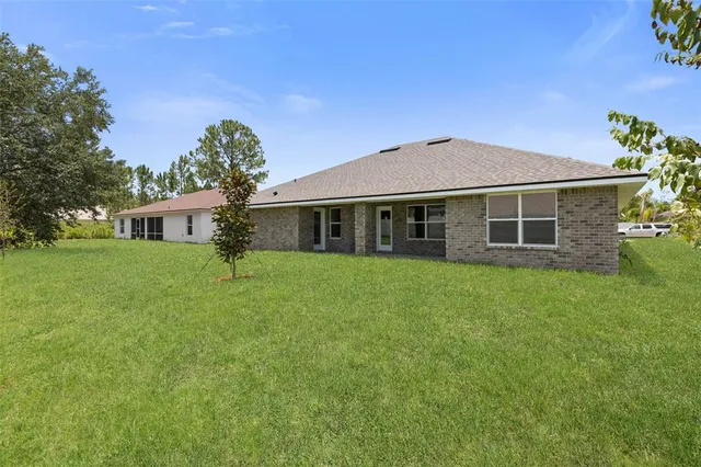 $375,900 | 128 Bird Of Paradise Drive, Palm Coast, FL 32137