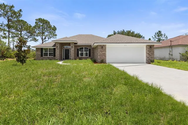 $375,900 | 128 Bird Of Paradise Drive, Palm Coast, FL 32137