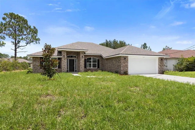 $375,900 | 128 Bird Of Paradise Drive, Palm Coast, FL 32137