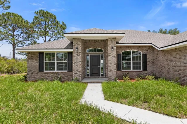 $375,900 | 128 Bird Of Paradise Drive, Palm Coast, FL 32137