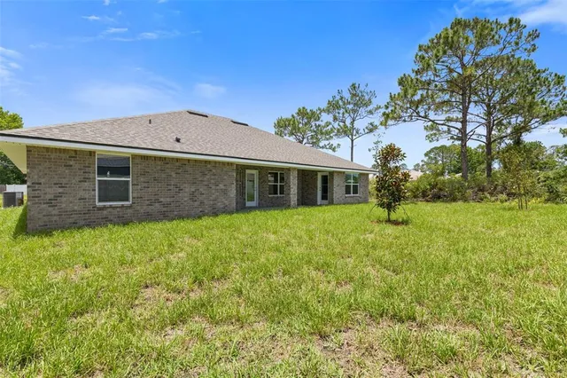 $375,900 | 128 Bird Of Paradise Drive, Palm Coast, FL 32137