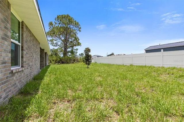 $375,900 | 128 Bird Of Paradise Drive, Palm Coast, FL 32137