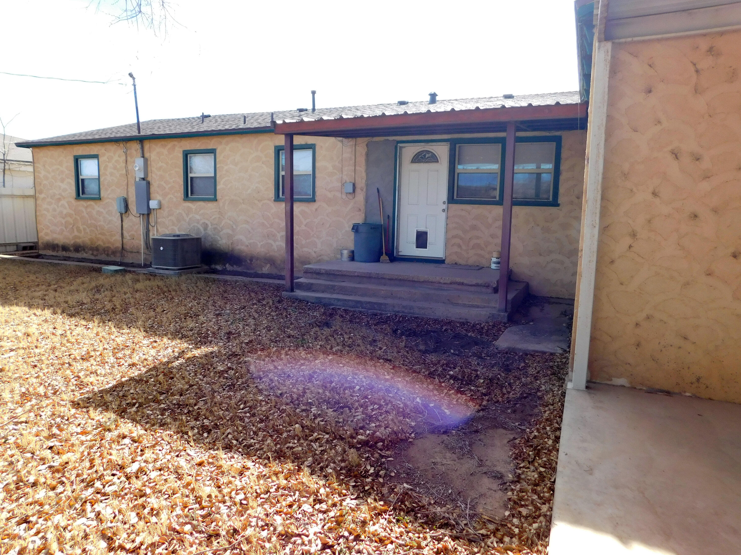 1722 West Ave B Muleshoe, TX 79347 - Photo 16 of 20 a view of a house with a backyard