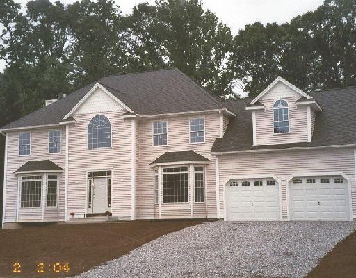 26 Brookfield Road Seymour, CT 06483 - Photo 1 of 1 a front view of a house with a garage