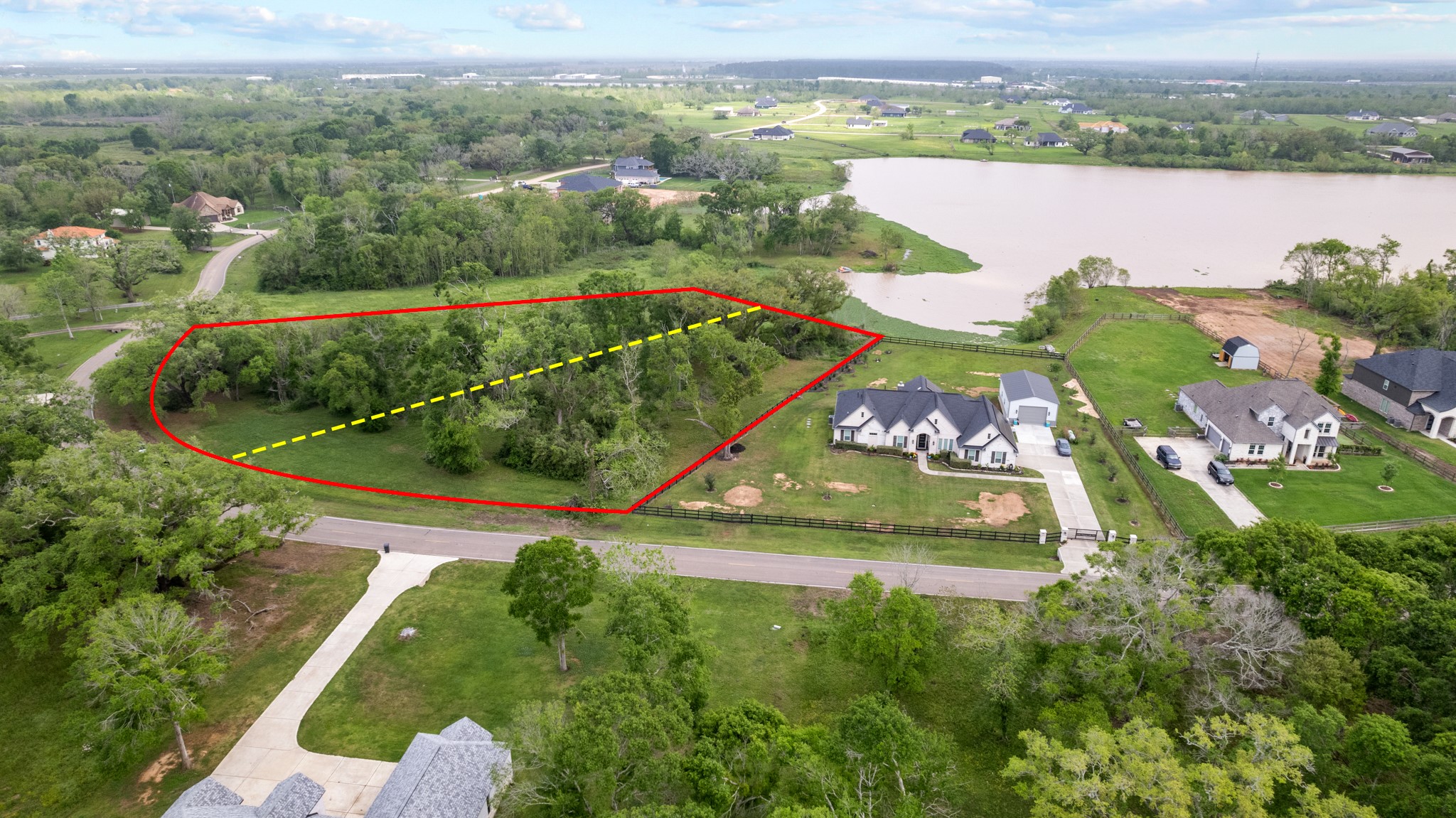 21702 Chenango Lake Drive Angleton, TX 77515 - Photo 11 of 21 an aerial view of residential houses with outdoor space and swimming pool