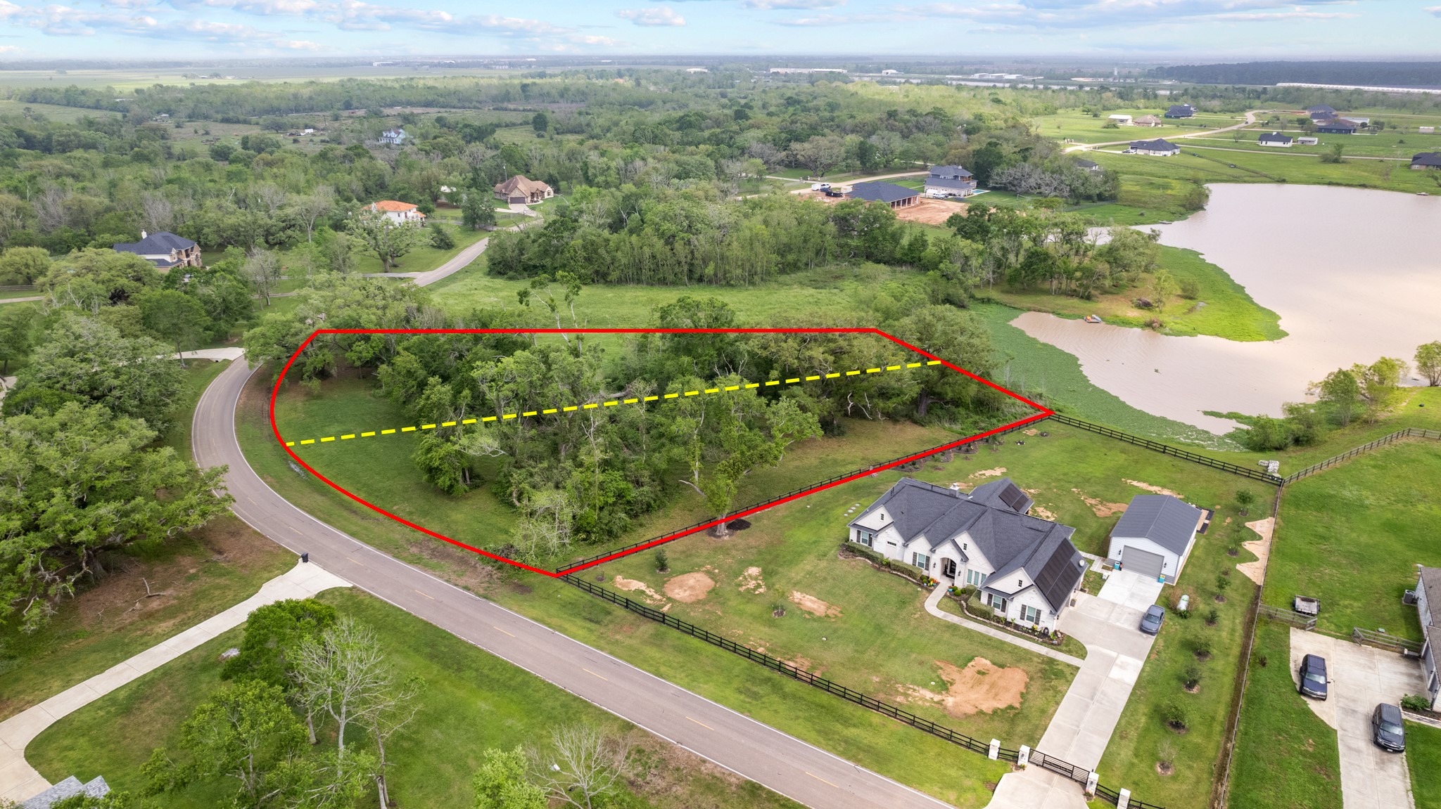 21702 Chenango Lake Drive Angleton, TX 77515 - Photo 12 of 21 an aerial view of river residential houses with outdoor space and swimming pool
